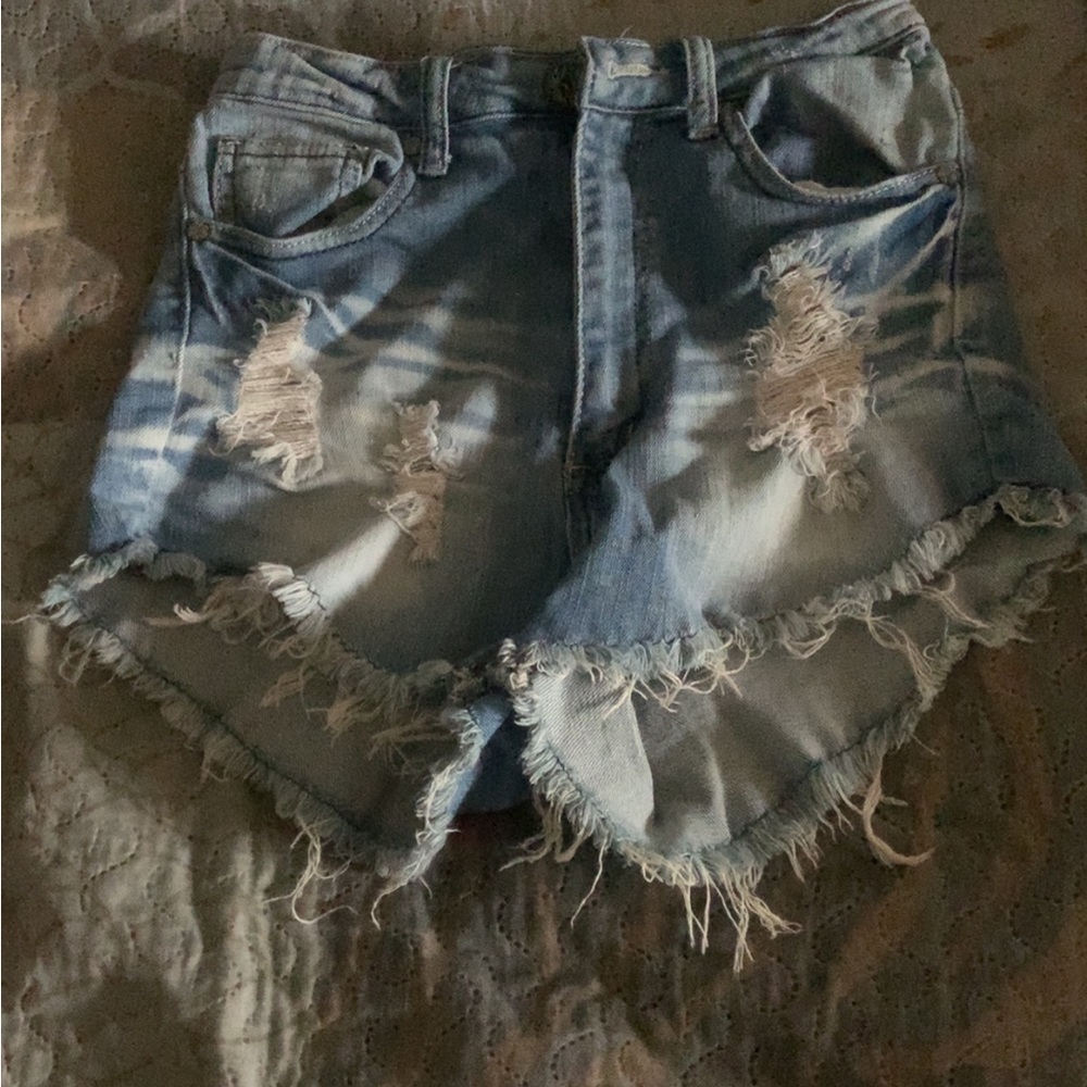 Medium wash high rise booty cut shorts